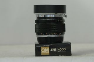 Olympus Zuiko Auto - S 55mm F1.  2 Lens with Cap & Hood 5