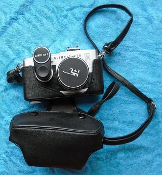 Olympus - Pen F 35mm Half Printcamera W/f.  Zuiko Auto - S1:1,  8 F=38mm&light Meter