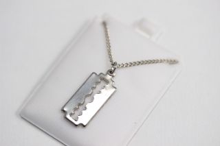 Vintage 1970s Razor Blade Pendant Necklace Old Stock Silver Tone 18 Inches