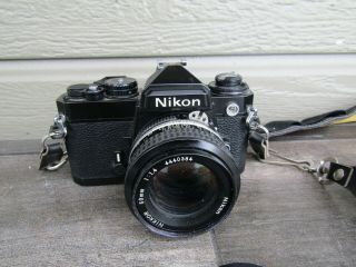 Vintage Nikon Fe 35mm Camera With Nikon Nikkor 50 Mm 1:1.  4 Lens -