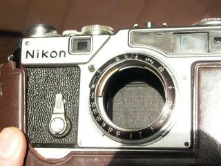 Nikon SP Nikkor - S.  c Rangefinder 5cm 1.  4 Ver4 Black w/ case bottom &Pat Pend Hood 9