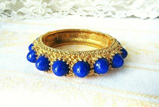 Vintage Jeanne Signed Hinged Cuff Bracelet Solid Gold Metal Blue Lucite Cones