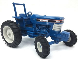 Vintage Ertl 1:16 Scale Diecast Metal Ford 7710 Blue Farm Tractor W/ Rollbar