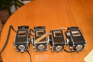 ROLLEIFLEX PARTS FROM FOUR CAMERAS,  INCLUDING SOME SHUTTERS,  LENSES ETC NR FS 10