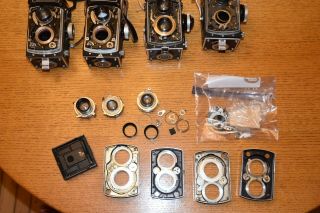 ROLLEIFLEX PARTS FROM FOUR CAMERAS,  INCLUDING SOME SHUTTERS,  LENSES ETC NR FS 2