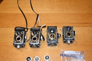 ROLLEIFLEX PARTS FROM FOUR CAMERAS,  INCLUDING SOME SHUTTERS,  LENSES ETC NR FS 3