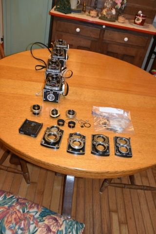 ROLLEIFLEX PARTS FROM FOUR CAMERAS,  INCLUDING SOME SHUTTERS,  LENSES ETC NR FS 7