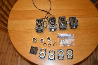 ROLLEIFLEX PARTS FROM FOUR CAMERAS,  INCLUDING SOME SHUTTERS,  LENSES ETC NR FS 8