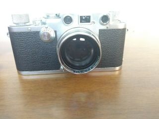 Leica D.  R.  P.  Ernst Leitz Wetzlar No.  605881 camera w/ f=5cm 1:2 No.  764437 lens 5