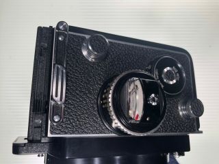 Rolleiflex 3.  5f TLR Camera Zeiss f3.  5 Planar 75mm with Prism and 10