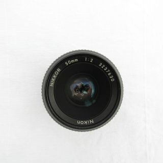 Nikon FE Compact 35mm single - lens - reflex camera,  w/ lenses & Motor Drive 9