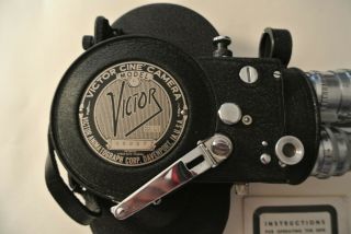 Victor Cine Camera with accessories in case. 2
