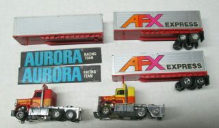 Two Vintage Aurora Afx Tractor Trailor Trucks And 3 Box Trailors