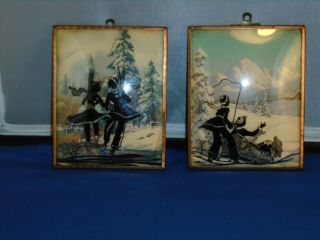Vintage Convex Victorian Woman Winter Sled And Skiers Silhouette Pictures (pair)