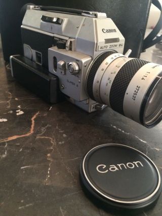 - Canon Auto Zoom 814 8 Movie Camera W/ F/1.  4 Zoom Lens W/ Case