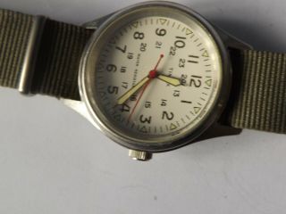 A Vintage Gents Timex Quartz Watch With Fabric Strap