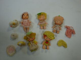 4 1979 Strawberry Short Cake Dolls,  1 1984 Doll W/ 2 Pets