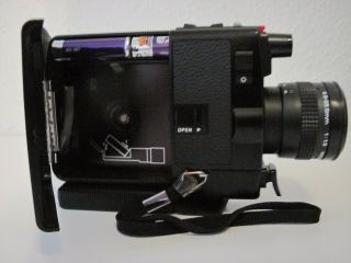 Canon 310 XL.  8 - Movie Camera.  in. 6