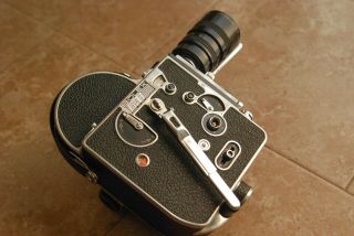 Bolex H 16S Camera body with a lens 12