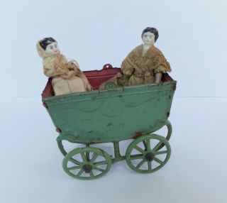 Two Antique German China Dolls & Pram