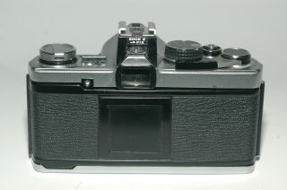 Olympus OM - 2 film camera with Olympus F.  Zuiko 50mm 1.  8 lens, 3