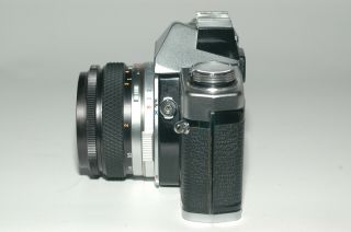 Olympus OM - 2 film camera with Olympus F.  Zuiko 50mm 1.  8 lens, 6