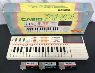 Vintage Casio Pt - 82 Keyboard With Rom Packs - - -