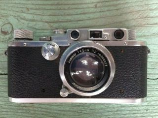 Leica D.  R.  P.  Ernst Leitz Wetzlar No.  183061 camera w/ f=5cm 1:2 No.  268628 lens 2