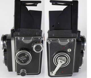Rollei Rolleiflex f2.  8 E Xenotar w/case mirror lens cap,  scissors strap,  STicky 3