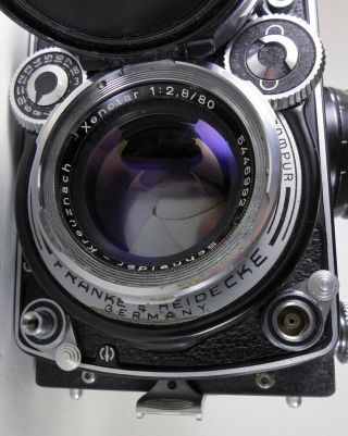 Rollei Rolleiflex f2.  8 E Xenotar w/case mirror lens cap,  scissors strap,  STicky 9