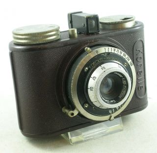 C.  1933 Kochmann Korelle 35mm Half Frame Reddish Brown Bakelite Compact Camera