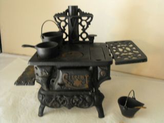 Vintage Crescent Cast Iron Mini Toy Stove With Accessories Smaller Version 2