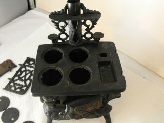 Vintage Crescent Cast Iron Mini Toy Stove With Accessories Smaller Version 6