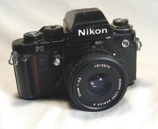 Nikon F3 Hp With Nikon Series E 35mm F2.  5 Lens And Field Case