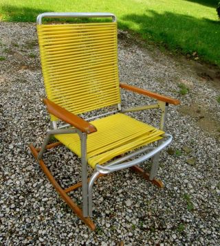 Vintage Aluminum And Wood Rocking Chair.  Patio.  Wooden Rockers And Arms.  Yellow