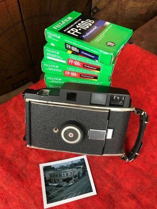 Polaroid land camera with FP - 100 C and FP - 100 B instant FujiFilm 2