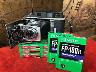 Polaroid land camera with FP - 100 C and FP - 100 B instant FujiFilm 3