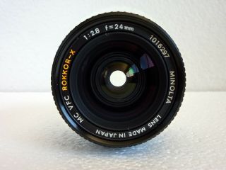 MINOLTA MC VFC ROKKOR - X 24mm f/2.  8 LENS & HOOD - ONE OWNER - NEAR 6