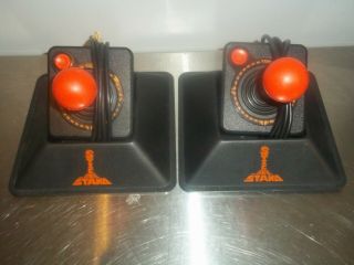 2 Vintage Atari 2600/7800 Oem Joysticks With Stik Stands And Toppers
