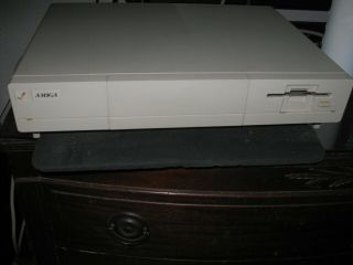 Amiga 1000; Includes Keyboard,  Mouse And Powercord.