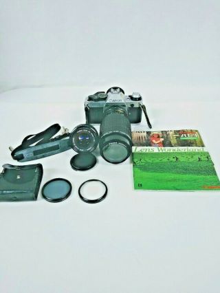 Canon Ae - 1 Program 35mm Slr Camera 2 Lenses Filters Strap Manuals