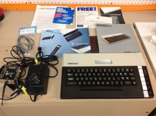 Atari 800XL computer,  AND,  power adapter,  TV Cables 3