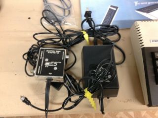 Atari 800XL computer,  AND,  power adapter,  TV Cables 6