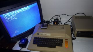 Atari 800 48K Computer With Matching 810 Disk Drive,  and - - - - 11