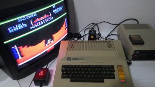 Atari 800 48K Computer With Matching 810 Disk Drive,  and - - - - 12