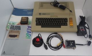 Atari 800 48K Computer With Matching 810 Disk Drive,  and - - - - 2