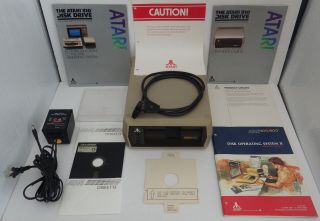 Atari 800 48K Computer With Matching 810 Disk Drive,  and - - - - 7