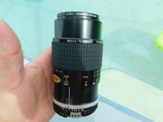 Nikon AF Micro Nikkor 105mm f/2.  8 Lens w/ L1Bc 52mm Filter 8