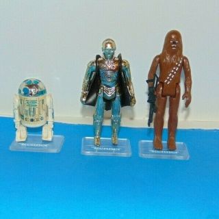 3 Vintage Star Wars Action Figures.  R2 - D2,  C - 3po,  Chewbacca,  Translucent Rifle
