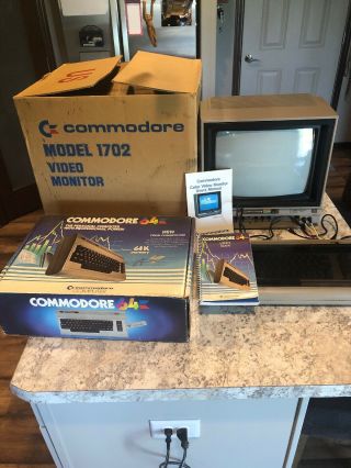 Commodore 64 Computer 1702 Monitor Joysticks 19 Cartridges